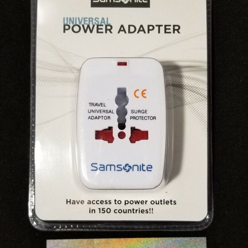 Samsonite Worldwide Universal Power Adaptor 44708-1908 White -NEW in pkg.